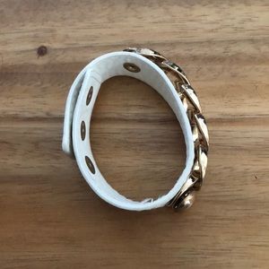 White cuff- leather with snaps